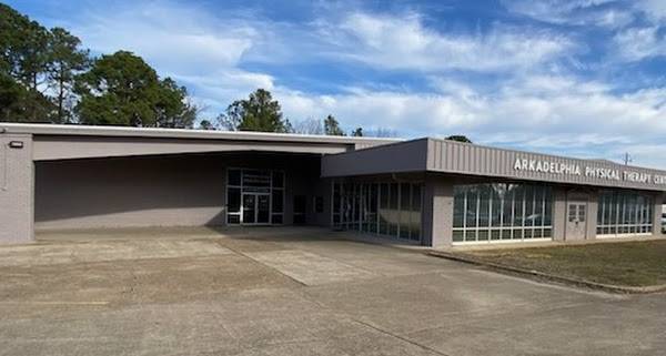 Exterior view of Arkadelphia Physical Therapy Center building on a sunny day